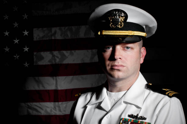 istock Portrait Caucasian Sailor Wearing White Uniform  American Flag Background 165776874