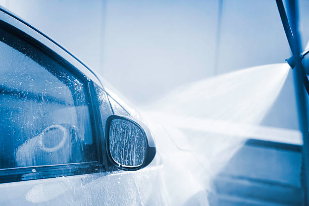 istock carwash with high pressure cleaner 165779171