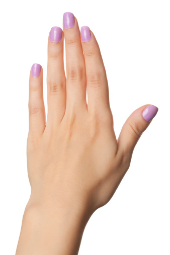 Woman hand with violet Gel/Acrylic nails isolated on white.