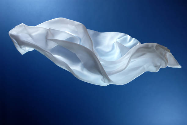 Flying white silk stock photo