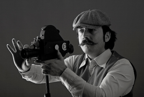 Portrait of film director behind camera