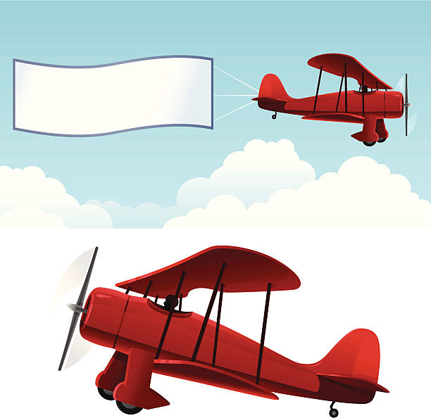 Biplane with banner Biplane with banner and isolated with copy space. words in the sky stock illustrations