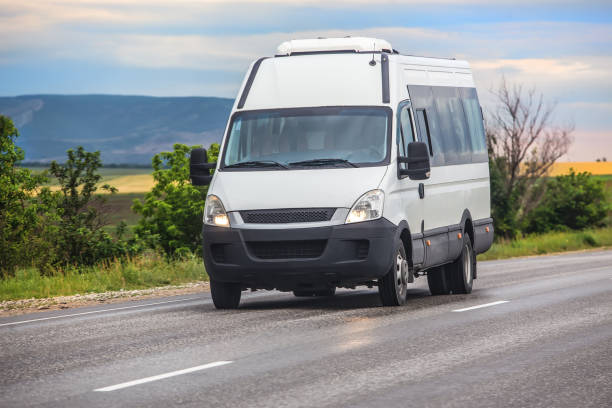 istock Minibus moves along road in mountainous area 1657962850