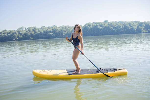 istock Cheerful young woman is taking a break by the river 1657964463