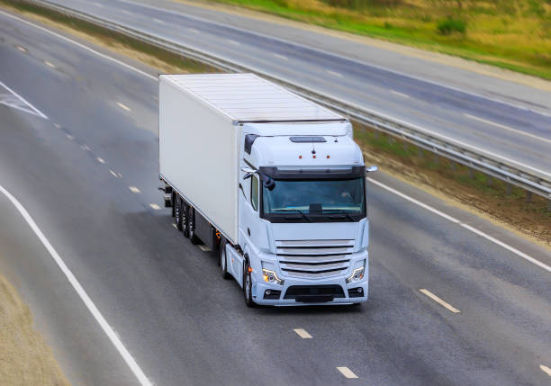 istock truck moves on highway 1657964466