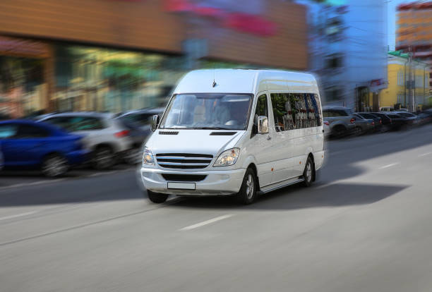 istock minibus goes on the city street 1657965516