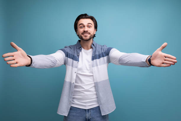 istock a kind brunette guy in a model appearance wants to cuddle on a studio background 1658007264