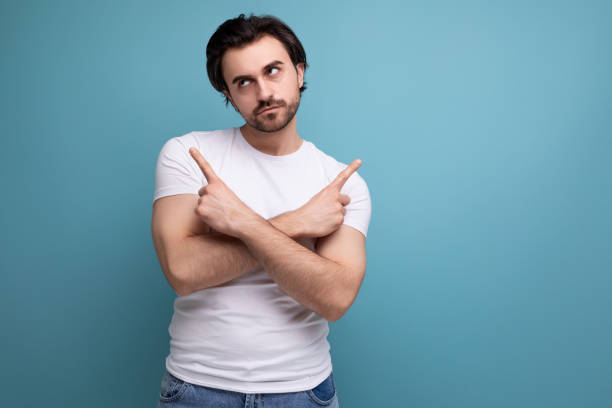 istock upset young man in white t-shirt on studio background with copyspace 1658008340