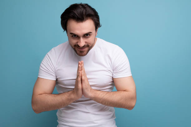 istock calm bearded man showing welcome gesture 1658008876