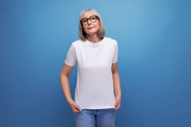 istock mature lady with bob haircut posing on studio background with mocap 1658009488