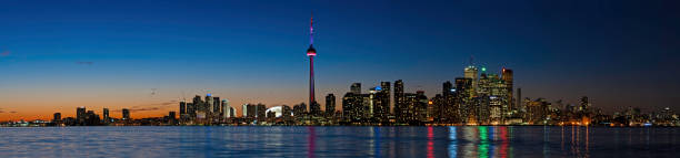 istock Toronto city skyline illuminated night towers panorama Canada 165802699