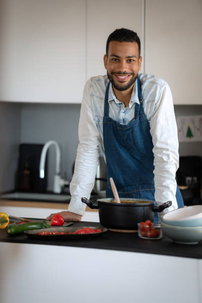 istock Friends prepare and cook lunch 1658044138