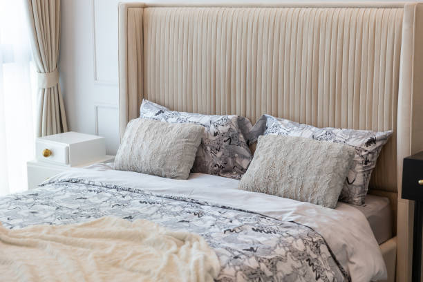 istock bed with comfortable in a luxurious white bedroom at a hose 1658057650