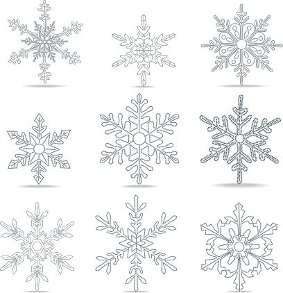 Vector illustration of a set of elaborate beaded snowflakes. High resolution jpg file included. ZOOM in to see beaded texture.