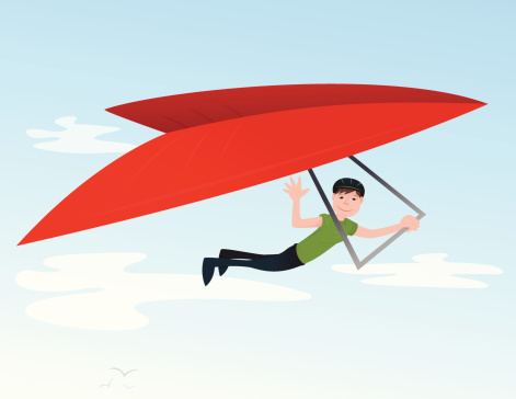 Vector illustration of a man hang gliding. This is a AI10 eps file. There are transparent effects used for many of the highlights and shadows. All transparent effects are saved on separate layers that are clearly labeled. 