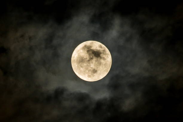 istock beautiful full moon cloudy sky 1658179258