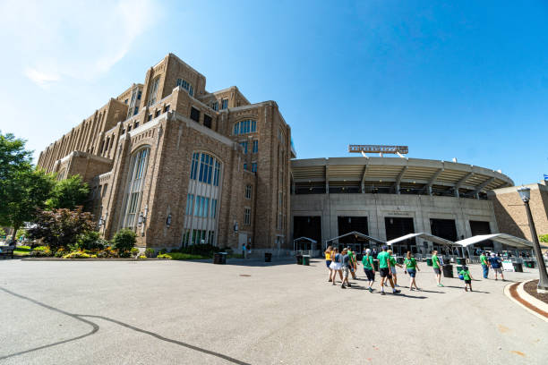 Lincoln, United States – June 23, 2021: Wide drone shot of Nebraska Cornhuskers stadium and city skyline.