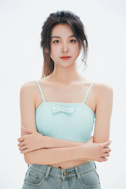 istock A Chinese female college student against a white background 1658185351
