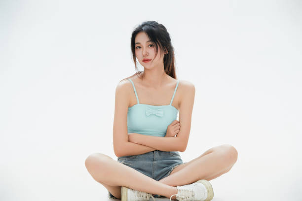 istock A Chinese female college student against a white background 1658189529