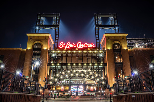 St. Louis, Missouri, USA - September 17, 2022: Busch Stadium is where the Major League Baseball team the Cardinals play. The Stan Musial statue stands here at the third base gate.