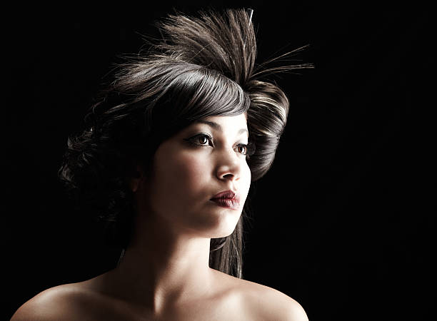 istock Beautiful geisha with dramatic hairstyle on black background 165821035