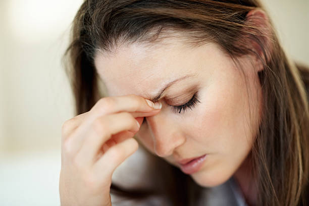 istock Woman having a big headache 165823144