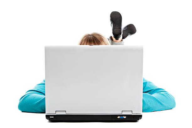 Femme teen derrière un ordinateur portable - Photo
