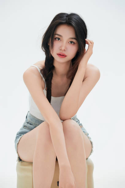 istock A Chinese female college student against a white background 1658241339