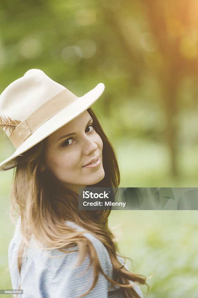 Country Girl,Natural Outdoors Portrait Young Woman enjoying a sunny day outdoors in green nature. Adult Stock Photo