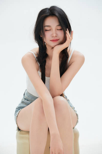 istock A Chinese female college student against a white background 1658241727