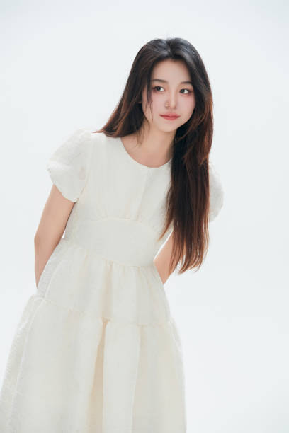istock A Chinese female college student against a white background 1658268133