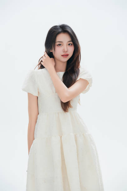 istock A Chinese female college student against a white background 1658268638