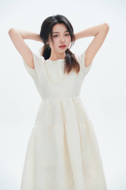 istock A Chinese female college student against a white background 1658268984