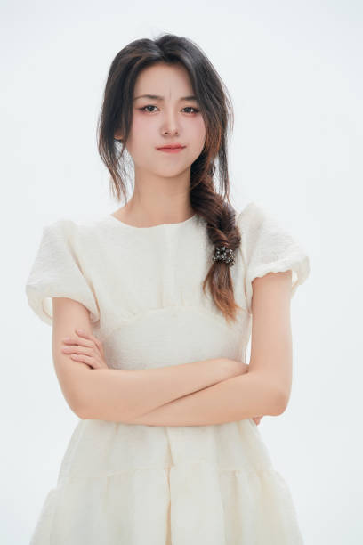 istock A Chinese female college student against a white background 1658275996