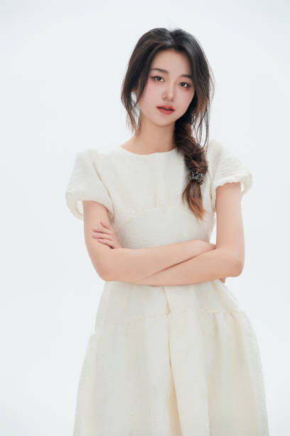 istock A Chinese female college student against a white background 1658275998