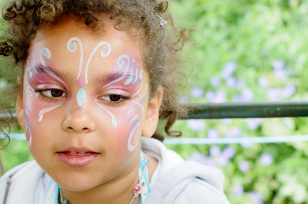 istock Girl (6-7) With Butterfly Face Paint, Portrait 165827632