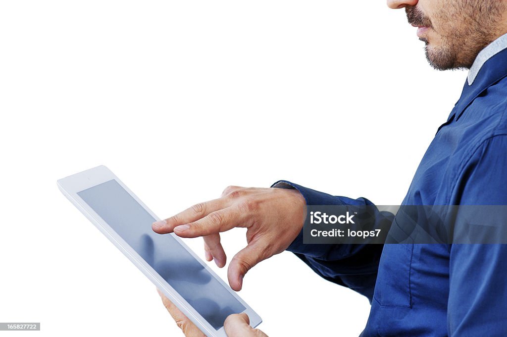 Un hombre de negocios utilizando Tablet con pantalla táctil - Foto de stock de Indicar libre de derechos
