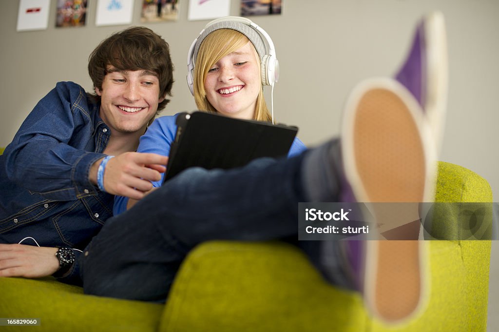 Adolescente di connettività - Foto stock royalty-free di Blu