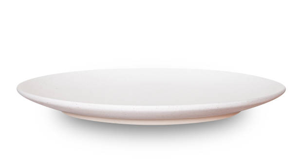 istock White circle ceramics plate isolated on white background. 1658304262