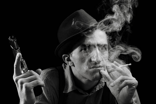 istock Cruel man holding gun 165830917