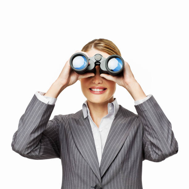 istock Businesswoman Looking Through Binoculars - Isolated 165833000