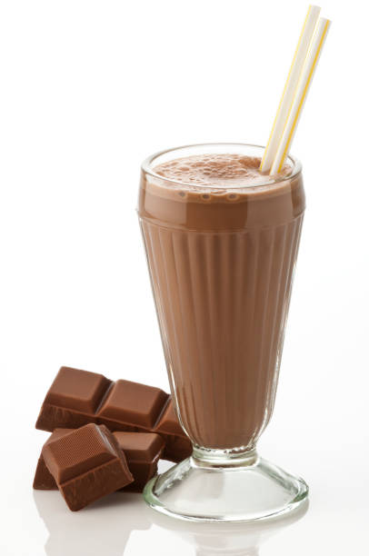 istock Glass of chocolate milkshake with chocolate chunks on white 165835353