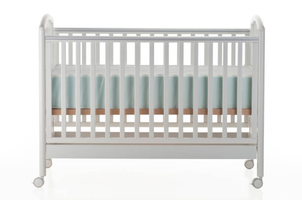 White baby crib on white background Baby Crib on White Background. Clipping Path Included. Similar Photos on my Portfoliohttp://i1215.photobucket.com/albums/cc503/carlosgawronski/BabyGoods.jpg crib stock pictures, royalty-free photos & images
