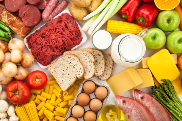 istock Table filled with different types of foods shot directly above 165835518