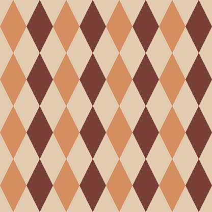 argyle seamless vector pattern in autumn colors. Traditional geometric vector argyle stitched background art for gift wrapping, socks, sweater, jumper, or trendy classic fashion