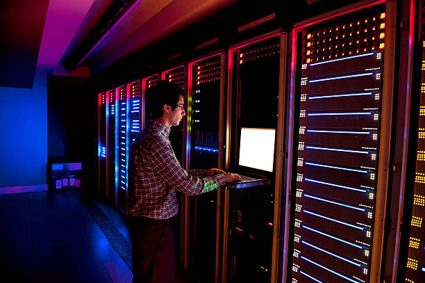 IT Engineer in Action Configuring Servers stock photo