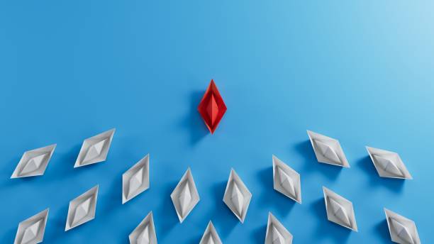 istock winner red paper ship. new ideas. paper art style. creative idea.3D rendering on blue background. 1658389484
