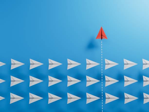 gruppo di piano di carta bianca in una direzione e un piano di carta rossa che punta in modo diverso. concetto di business per nuove idee, creatività, innovazione e soluzione.3d rendering su sfondo blu. - gruppo dei 20 immagine foto e immagini stock