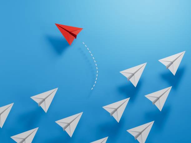 istock Different business concept.Red paper plane changing direction from white paper plane. new ideas. paper art style. creative idea.3D rendering on blue background. 1658390044