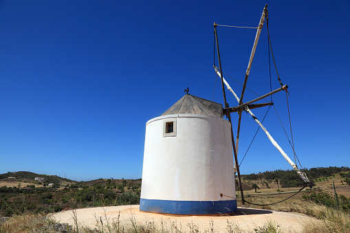 Old windmill in Algarve region, Portugal